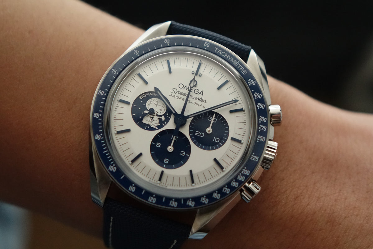 Omega Speedmaster Snoopy 50th anniversary 310.32.42.50.02.001 full set