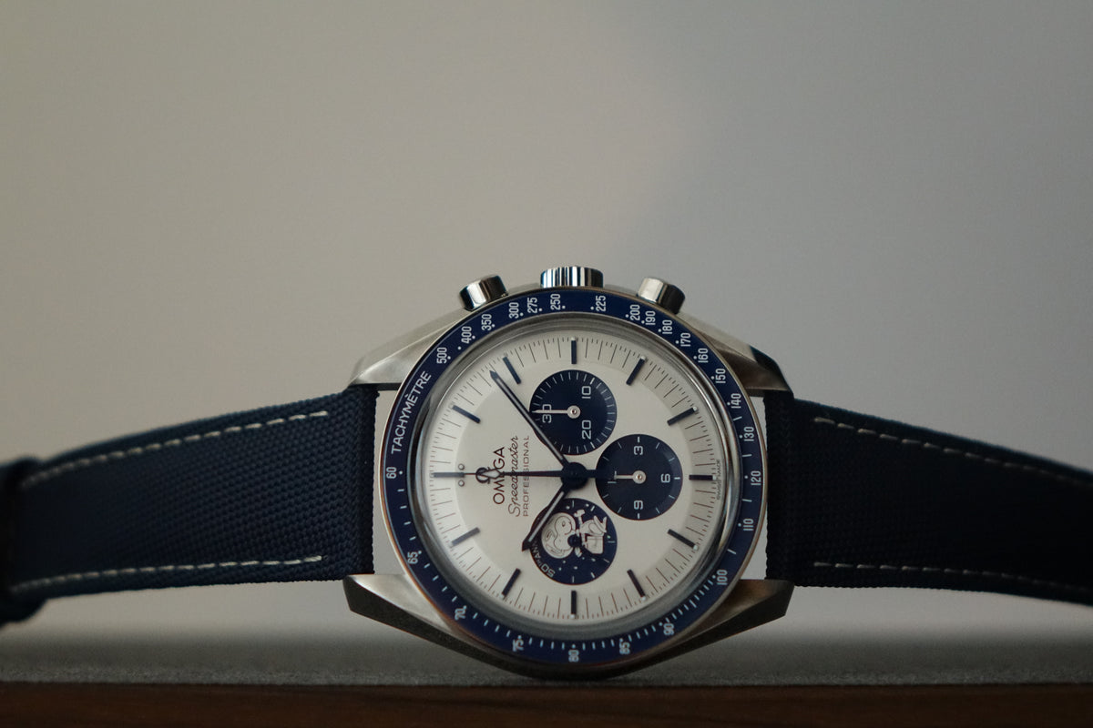 Omega Speedmaster Snoopy 50th anniversary 310.32.42.50.02.001 full set