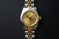 Rolex Oyster Perpetual Datejust 26 67193 half gold diamond champagne dial