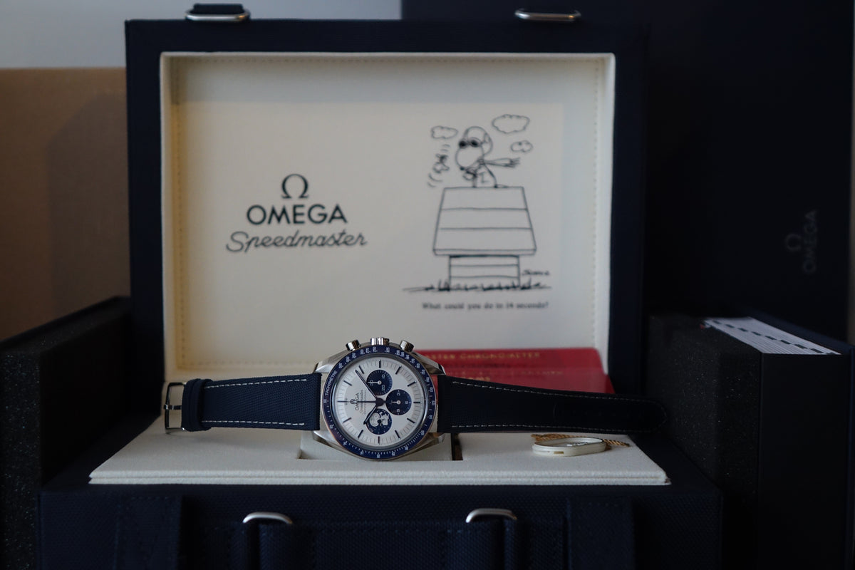 Omega Speedmaster Snoopy 50th anniversary 310.32.42.50.02.001 full set