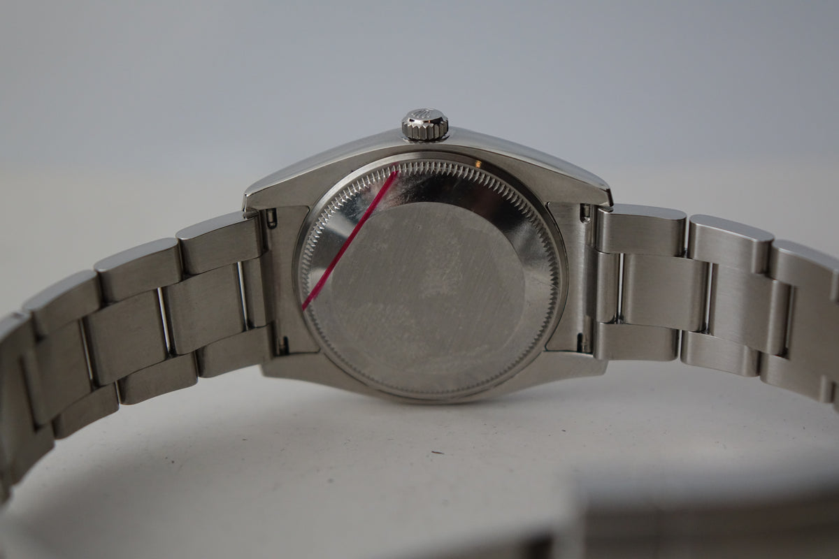 Rolex Oyster Perpetual Date 34 115200 roman numerals full set