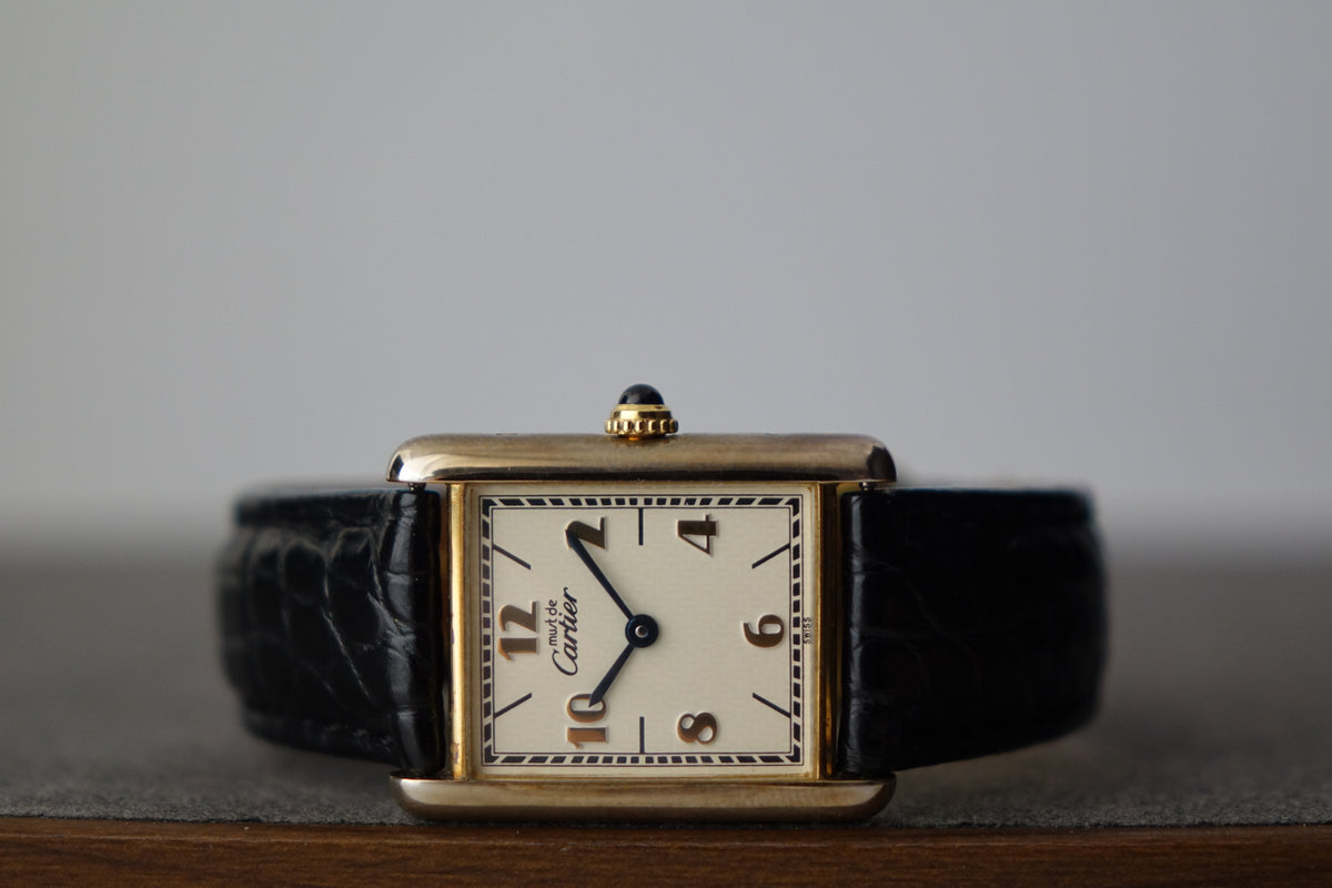Cartier Tank Vermeil 590005 monogram embossed dial watch only