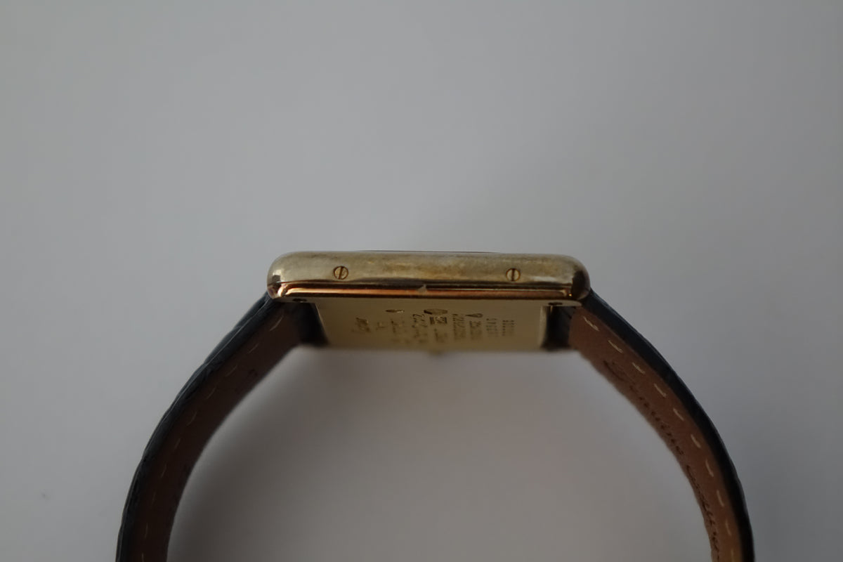Cartier Tank Vermeil 590005 monogram embossed dial watch only