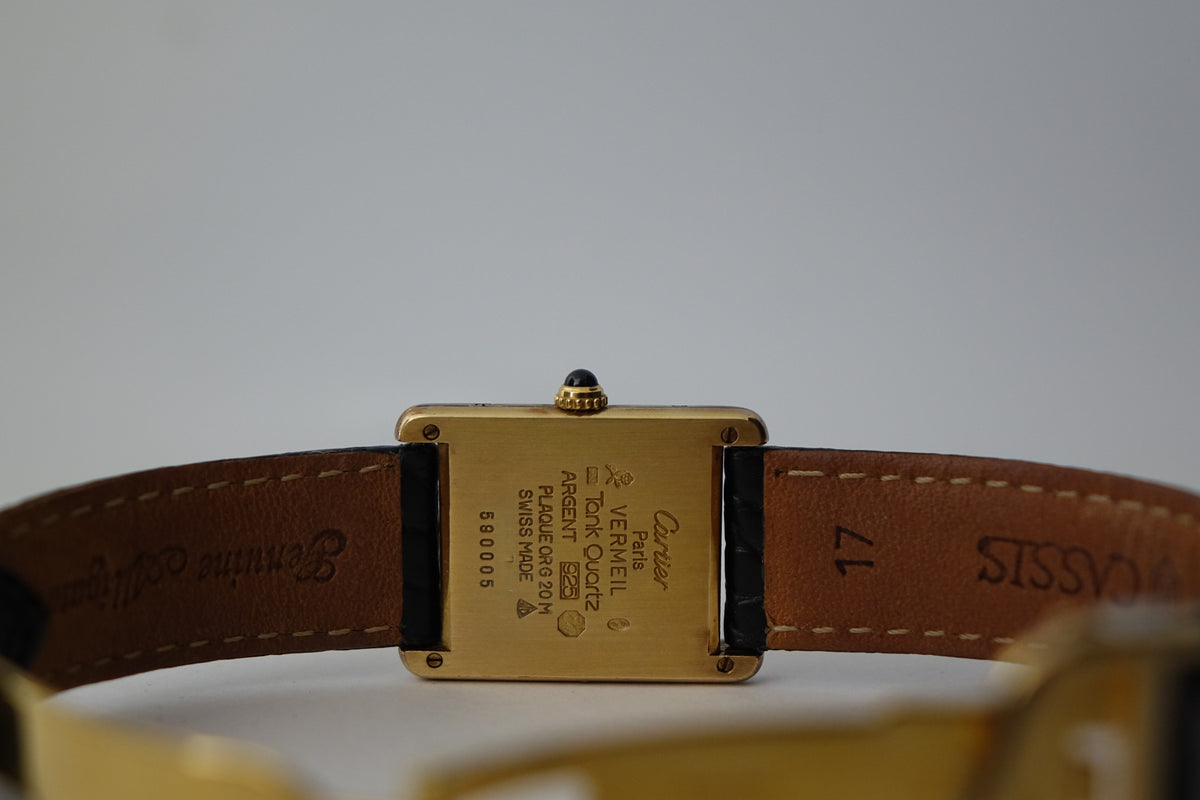 Cartier Tank Vermeil 590005 monogram embossed dial watch only