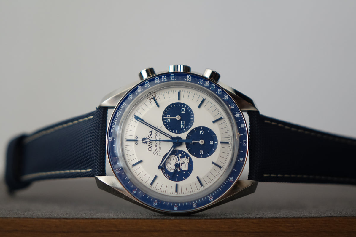BNIB Omega Speedmaster Snoopy 50th anniversary 310.32.42.50.02.001 Speedmaster 'Silver Snoopy Award'