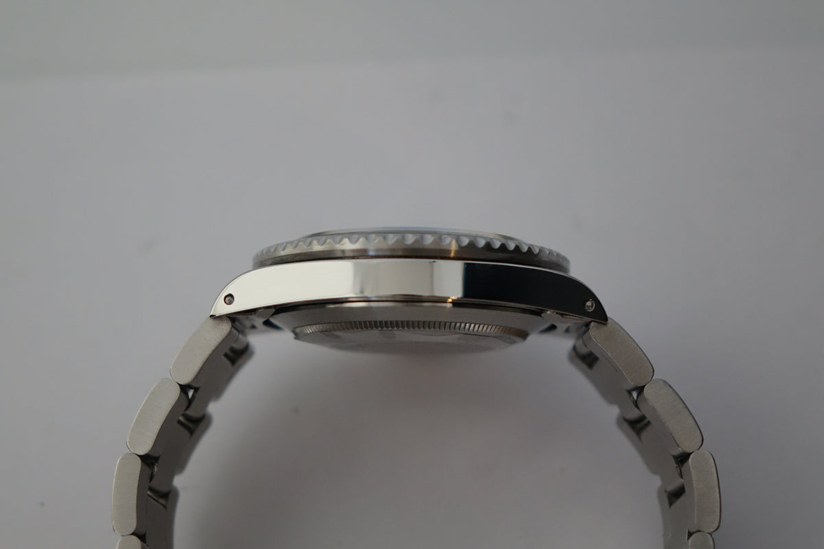 Rolex Submariner Date 168000 Triple Zero full set