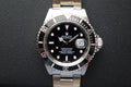 Rolex Submariner Date 16610LN with RSC Service card